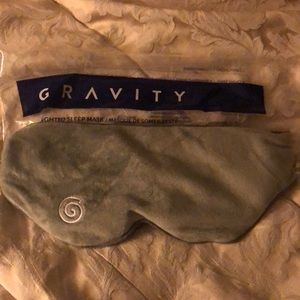 Gravity weighted sleep mask